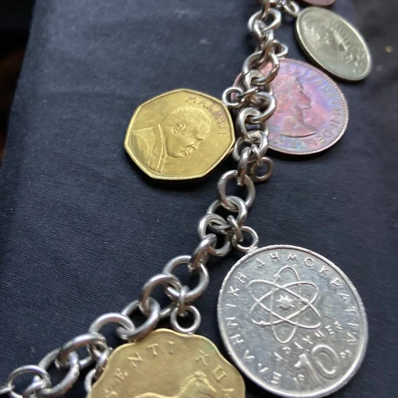 925 sterling silver coin charm bracelet 11 of them on here milor bracelet